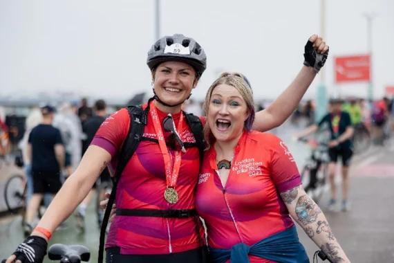 image of L2B rider Rachel Moore and a friend