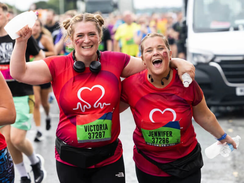 BHF runners celebrating at the finish line