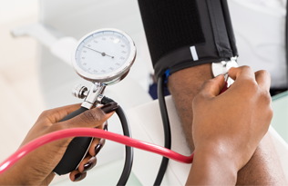 blood pressure being monitored