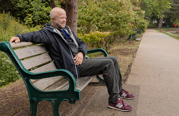 Gary Rolfe sitting on a bench