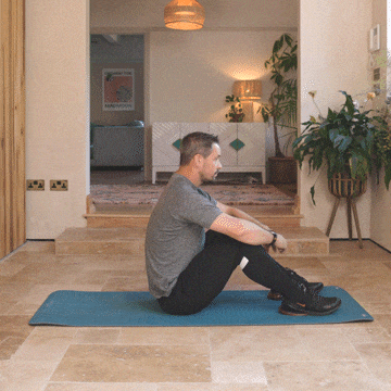 Andrew Scard demonstrates the bicep stretch.