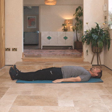 Andrew Scard demonstrates the lying spine twist.