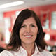A headshot of Tracy Parker in an office.